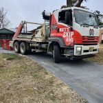 Our truck dropping off a bin