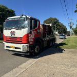 Our truck dropping off a bin